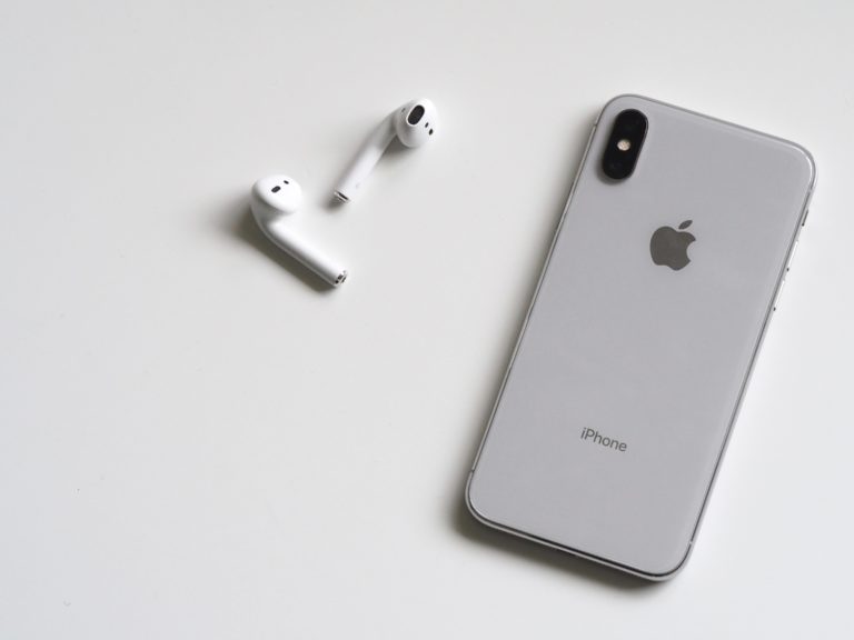 iPhone with Apple Airpods